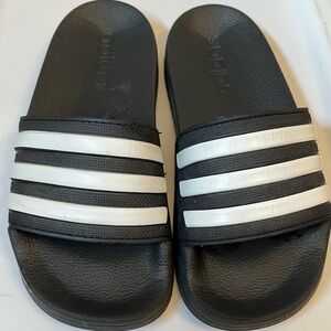 Kids water shoes 2 size 12. Adidas slides size 13.